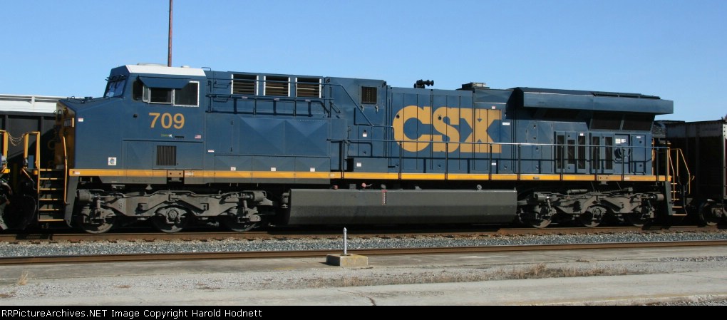 CSX 709 is power for a coal train